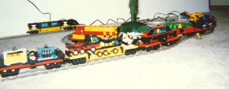 Red and Yellow in action, with freight set, around the tree