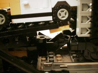 auto loading rack holding coupler