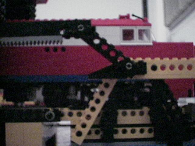 Side Detail View showing lift hinge